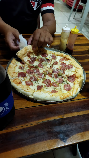 Foto 1 La Casa da Pizza