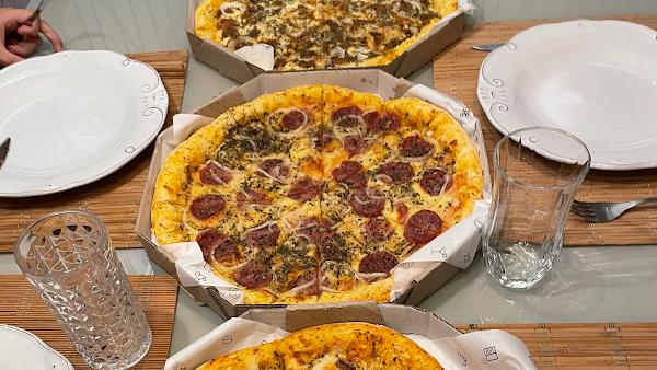 Foto 0 Capeesh Pizzaria